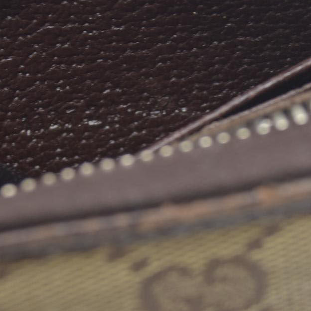 Gucci  Monogram Metal Bar Zip Around Wallet Dark Brown