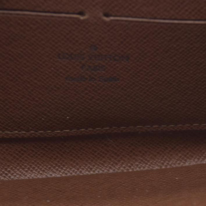 $915 Louis Vuitton 2011 LV Monogram Zippy Wallet CA1131