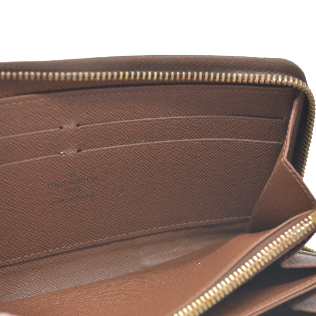 AUCTION $915 Louis Vuitton Monogram Zippy Wallet SP0143 2013