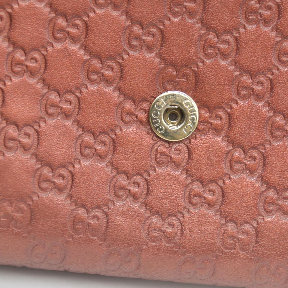 $880 Gucci  Sukey Microguccissima Pattern Continental Wallet Dark Pink CONSIGNMENT
