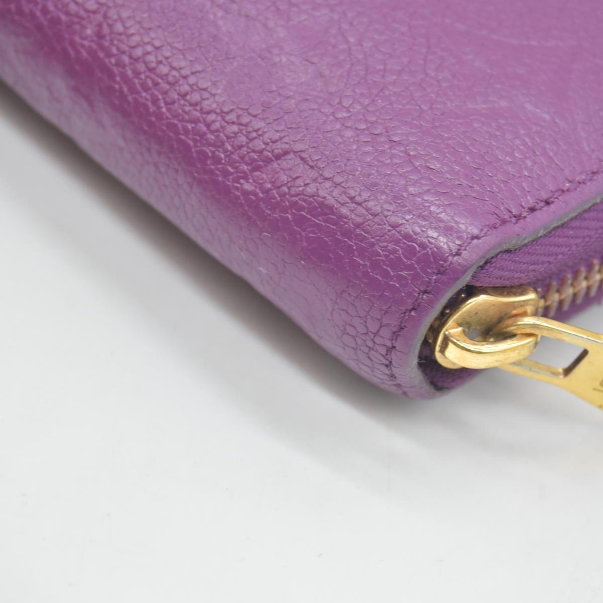 $1170 2014 Louis Vuitton Empreinte Zippy Wallet Raisin SP0144 CONSIGNMENT