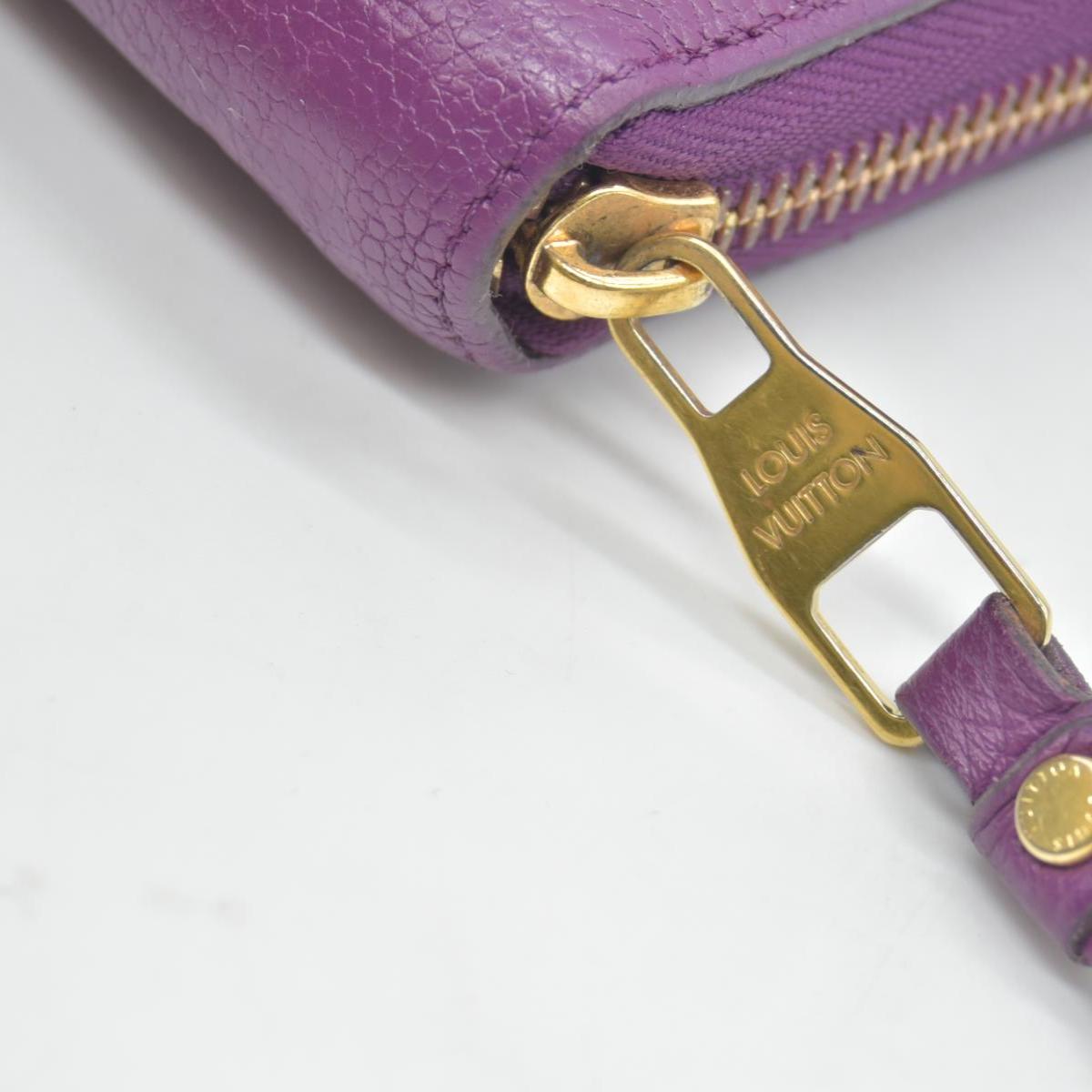 $1170 2014 Louis Vuitton Empreinte Zippy Wallet Raisin SP0144 CONSIGNMENT