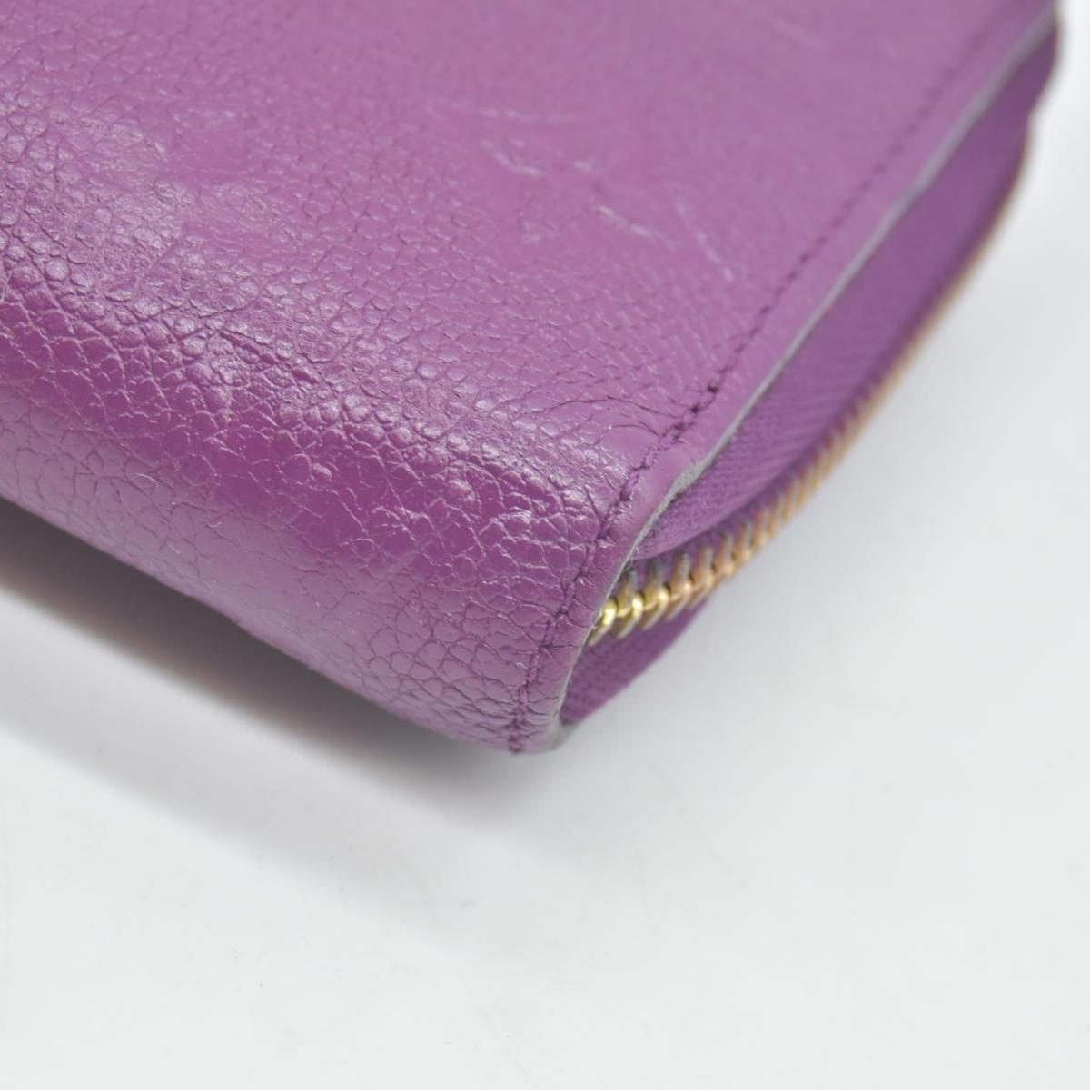 $1170 2014 Louis Vuitton Empreinte Zippy Wallet Raisin SP0144 CONSIGNMENT