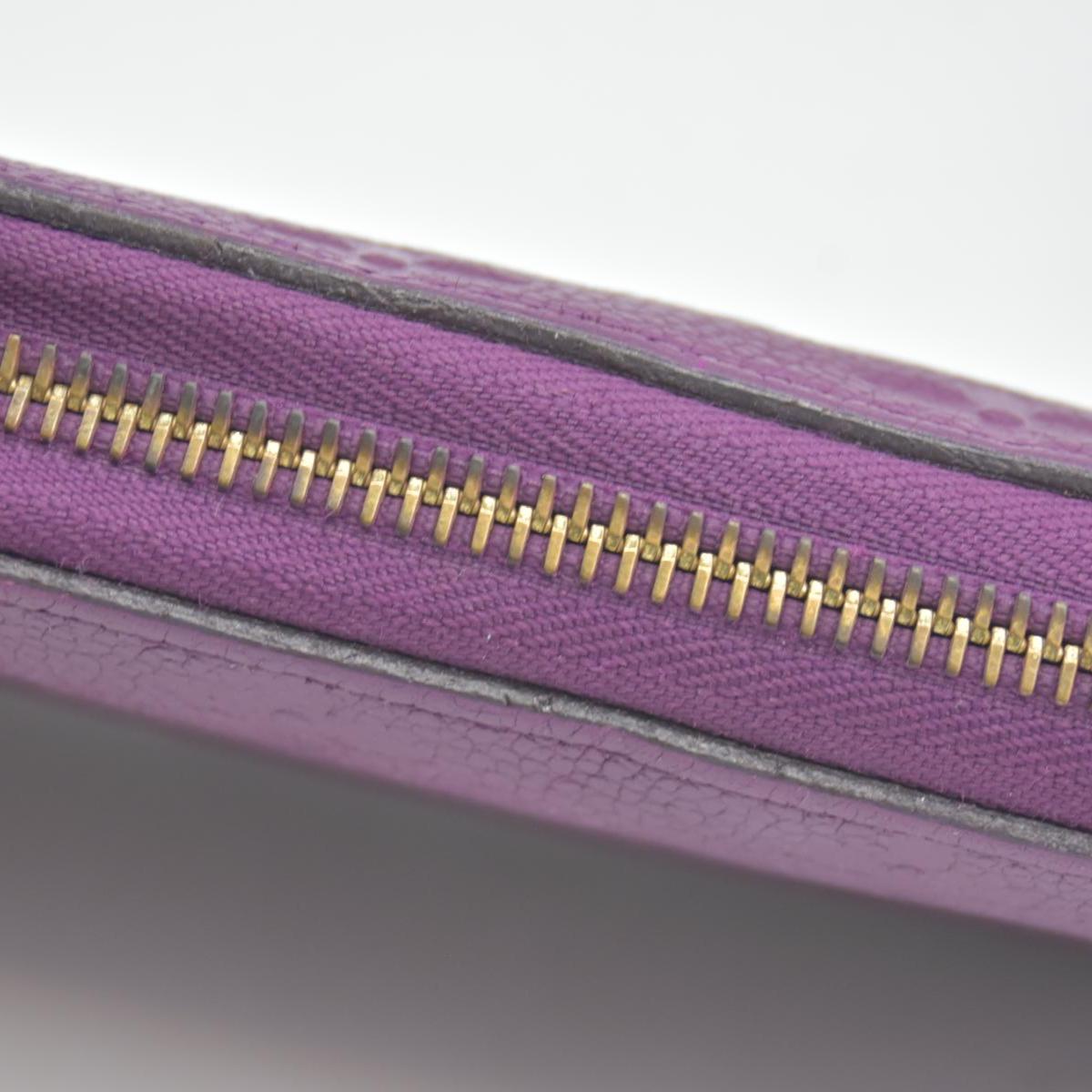 $1170 2014 Louis Vuitton Empreinte Zippy Wallet Raisin SP0144 CONSIGNMENT