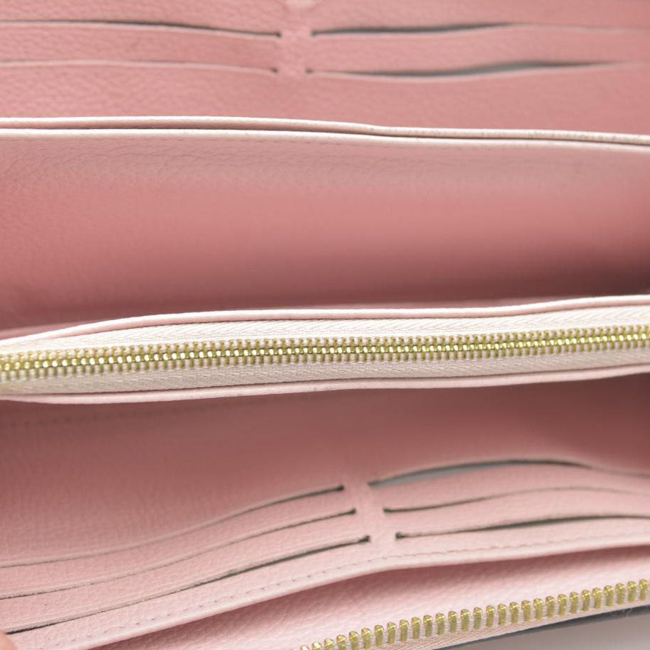 LOUIS VUITTON Empreinte Monogram Giant By The Pool Zippy Wallet Bouton De Rose RFID