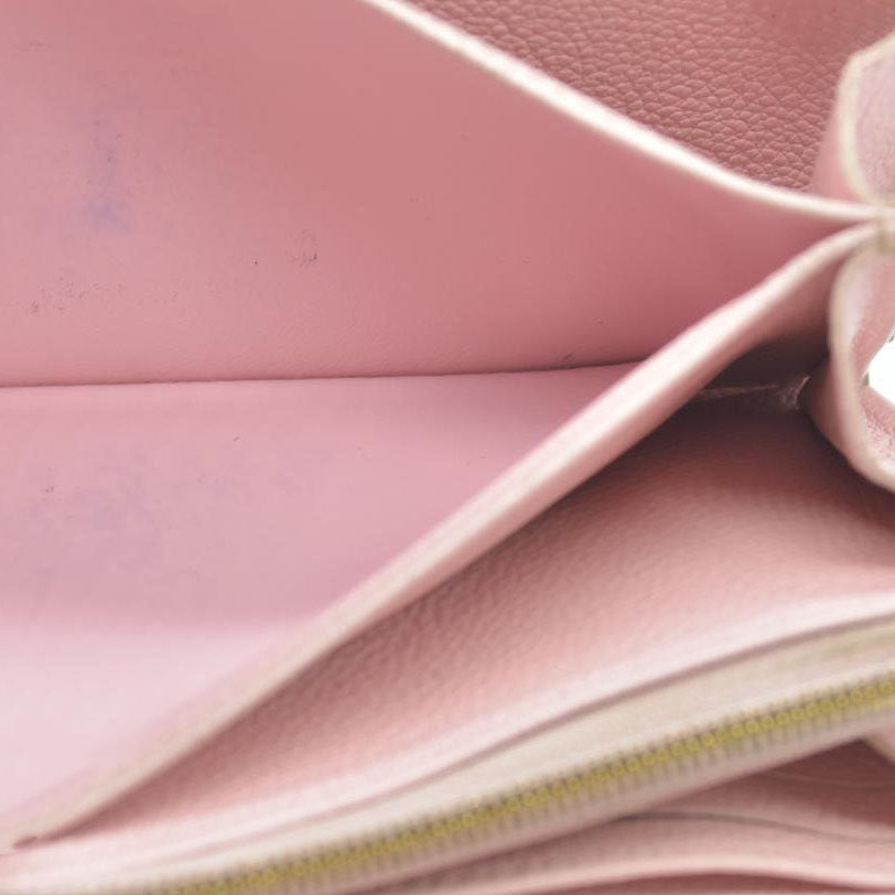 LOUIS VUITTON Empreinte Monogram Giant By The Pool Zippy Wallet Bouton De Rose RFID