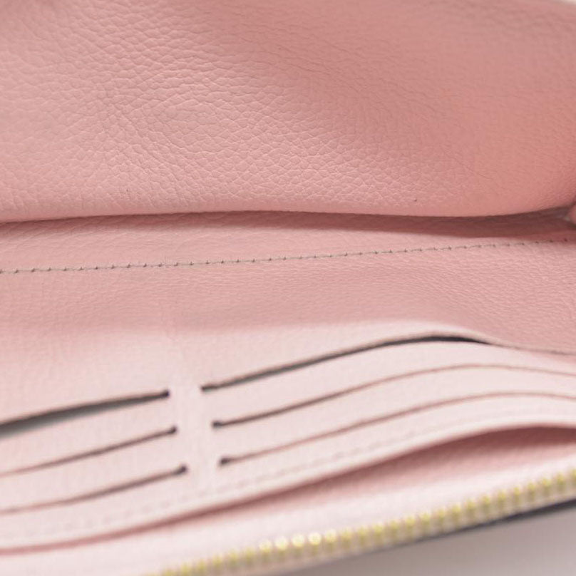 LOUIS VUITTON Empreinte Monogram Giant By The Pool Zippy Wallet Bouton De Rose RFID