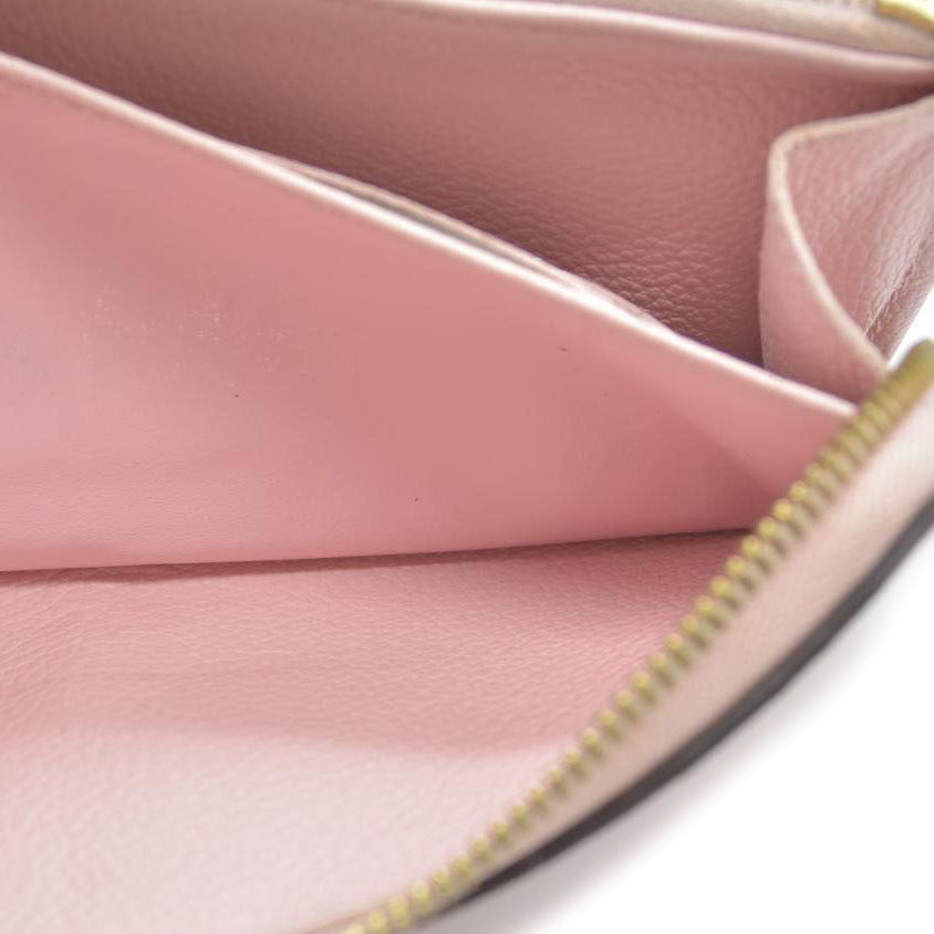 LOUIS VUITTON Empreinte Monogram Giant By The Pool Zippy Wallet Bouton De Rose RFID