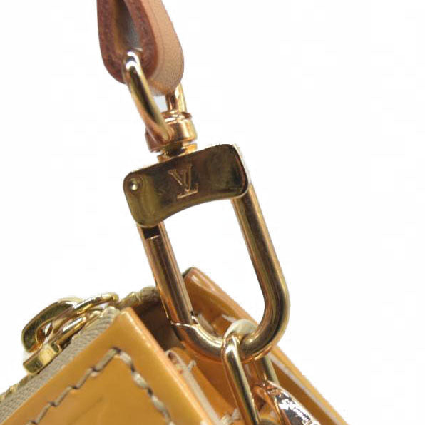 $740 Louis Vuitton  Vernis Lexington Pochette Beige