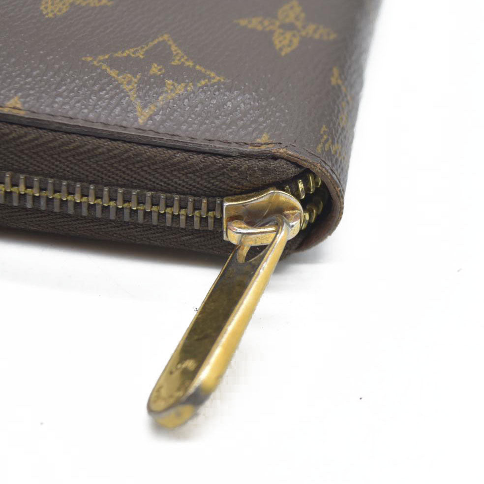 AUCTION $915 Louis Vuitton  Monogram Zippy Wallet CA0122