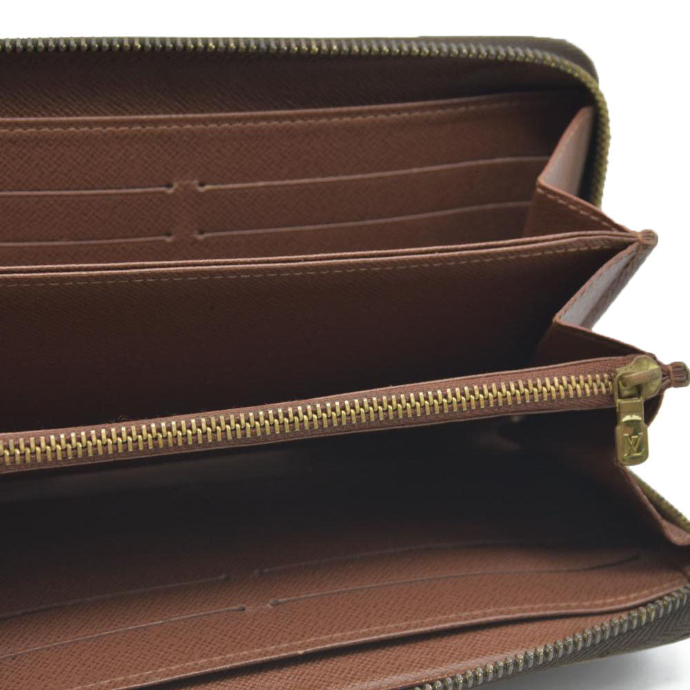 AUCTION $915 Louis Vuitton  Monogram Zippy Wallet CA0122
