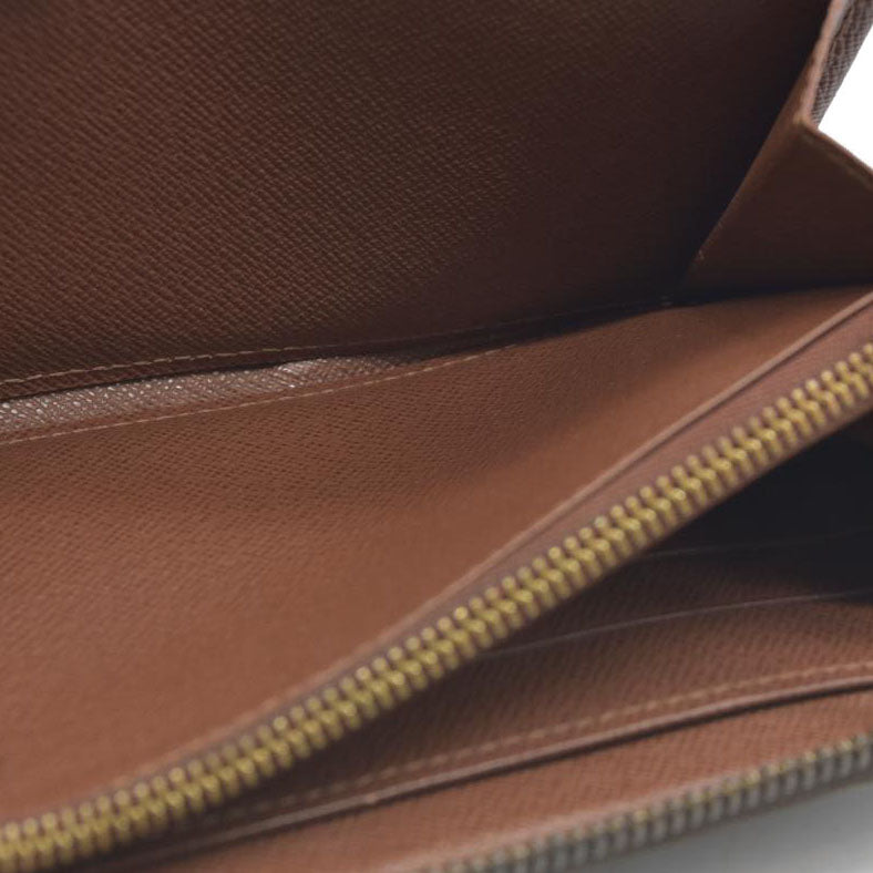 AUCTION $915 Louis Vuitton  Monogram Zippy Wallet CA0122