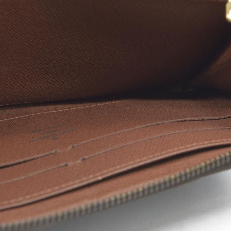 AUCTION $915 Louis Vuitton  Monogram Zippy Wallet CA0122