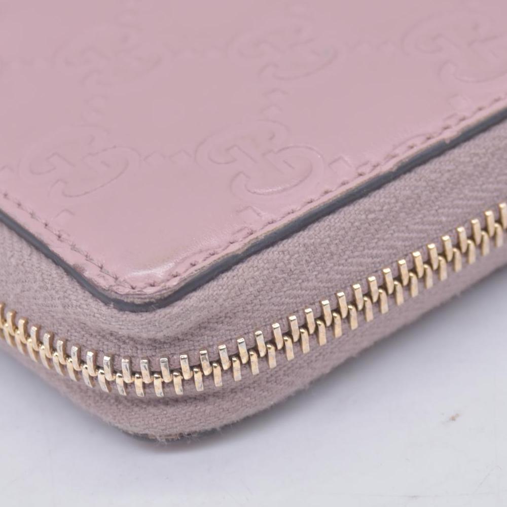$730 Gucci Guccissima Bow Zip Around Wallet CONSIGNMENT 10021229