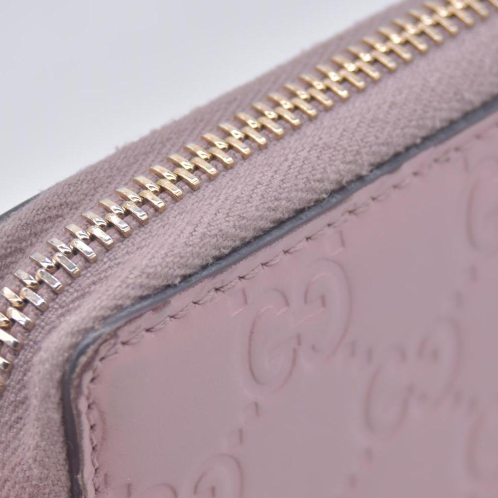 $730 Gucci Guccissima Bow Zip Around Wallet CONSIGNMENT 10021229