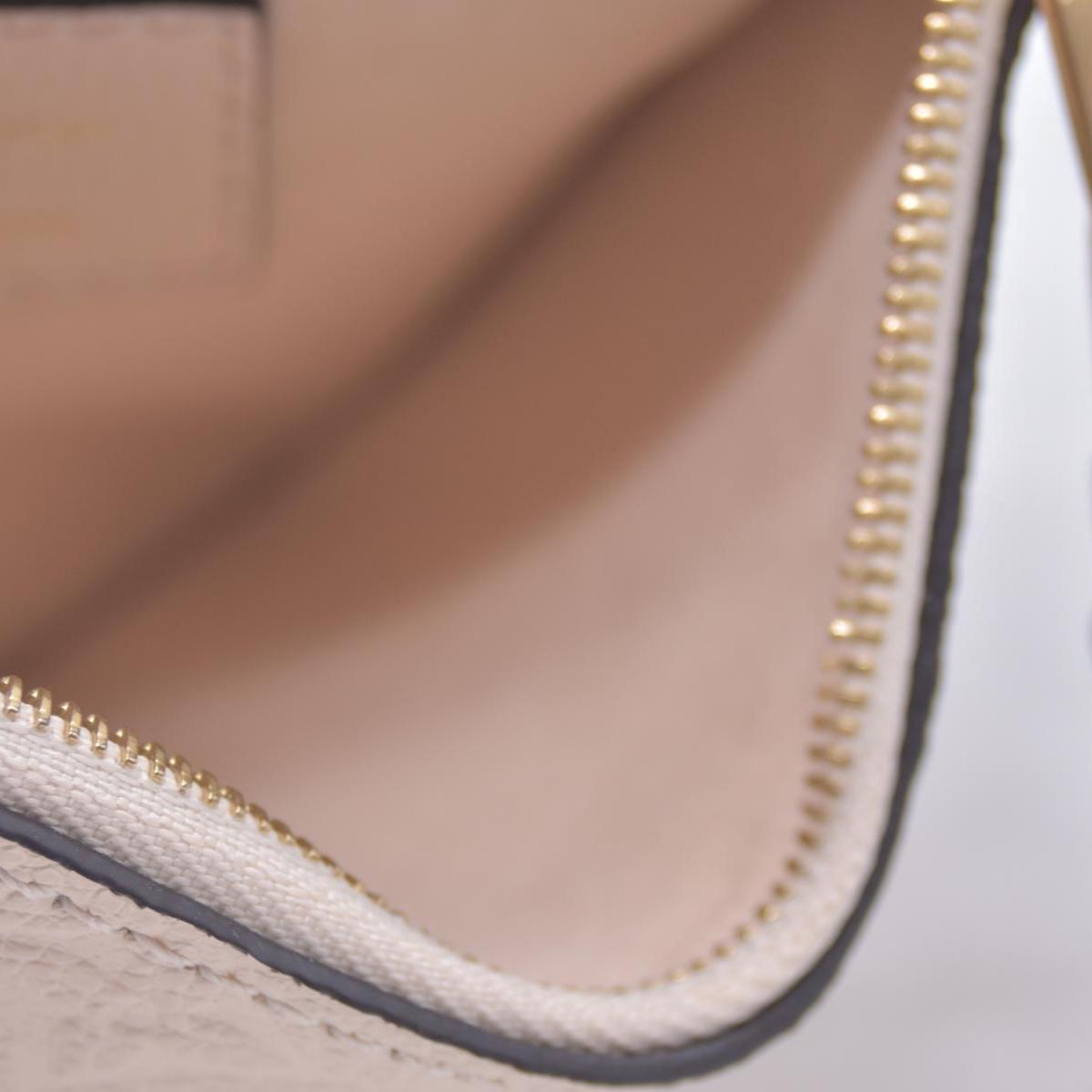 $650 Louis Vuitton Key Pouch S Empreinte Cream CONSIGNMENT