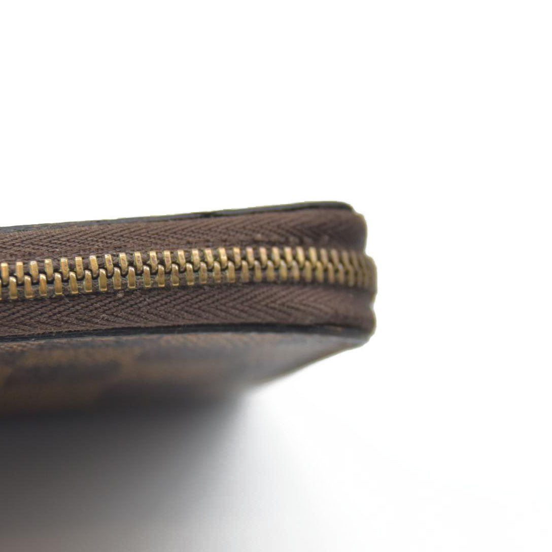 $545 Louis Vuitton Damier Ebene Zippy Coin Purse AUCTION