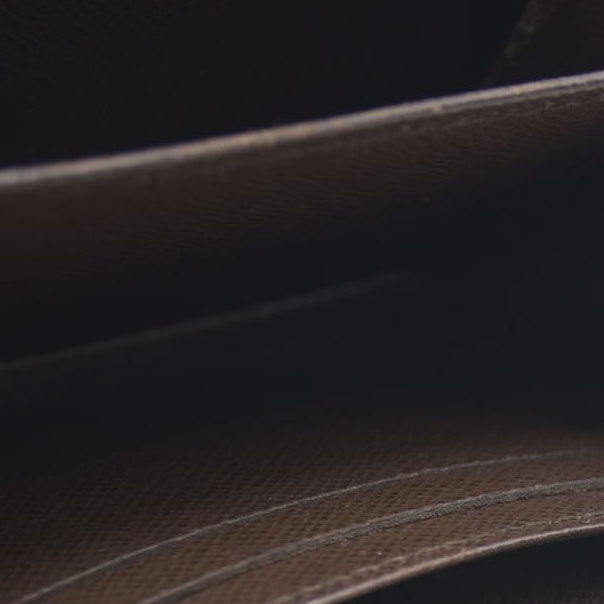 $545 Louis Vuitton Damier Ebene Zippy Coin Purse AUCTION