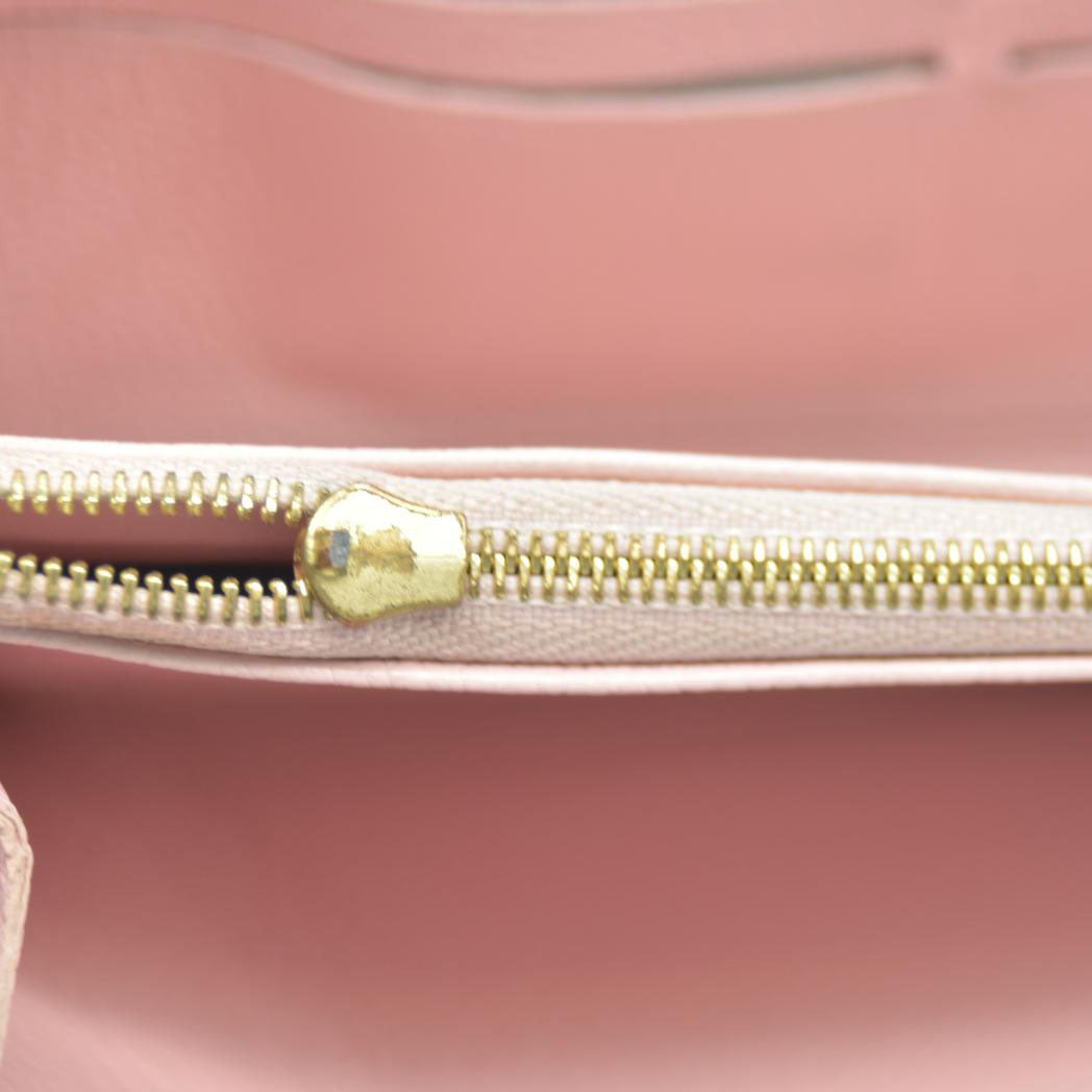 LOUIS VUITTON Empreinte Monogram Giant By The Pool Zippy Wallet Bouton De Rose RFID