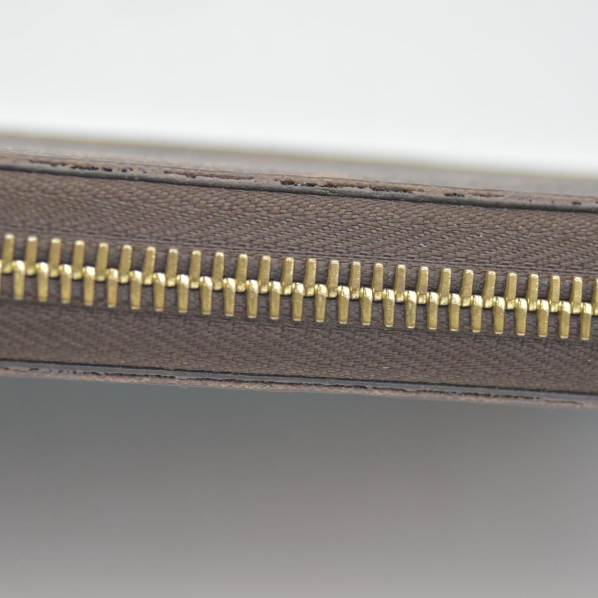 $915 Louis Vuitton Monogram 2015 Christmas Animation Zippy Wallet Hibiscus CONSIGNMENT