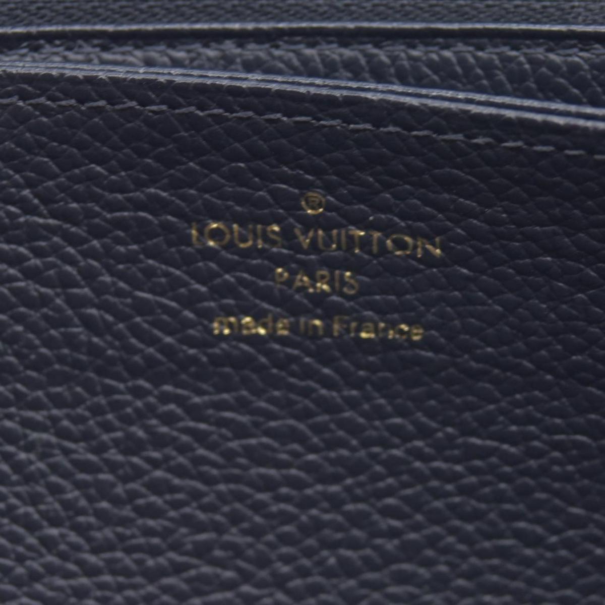 $1170 BROKEN 2019  Louis Vuitton Zippy Wallet Empreinte Marine Rouge SP4179 CONSIGNMENT