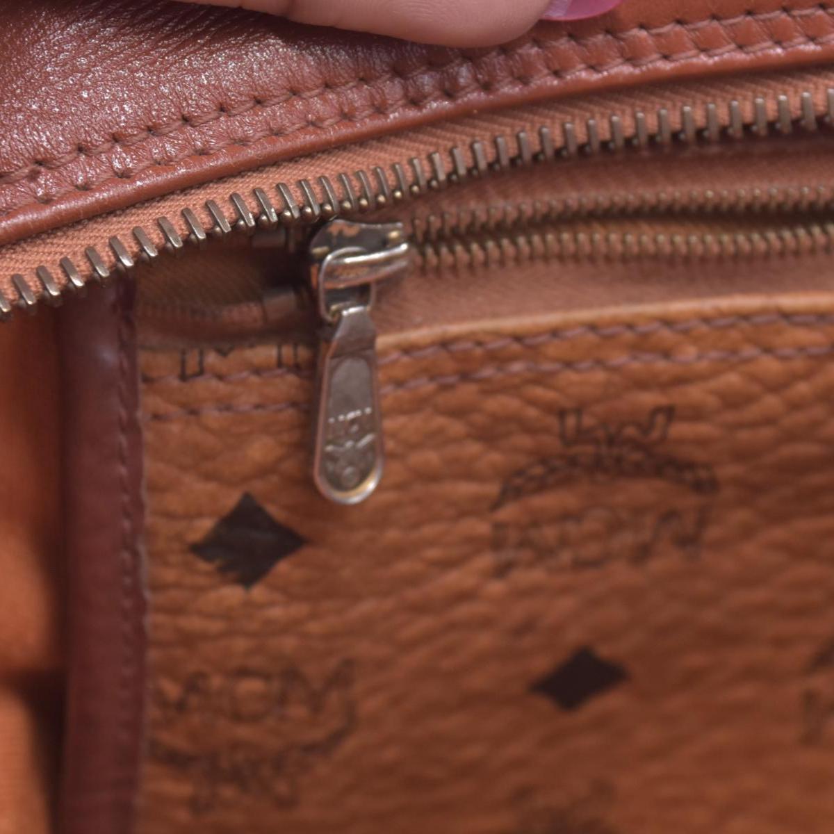 $980 MCM Visetos Flap Messenger Bag Cognac CONSIGNMENT 10021348