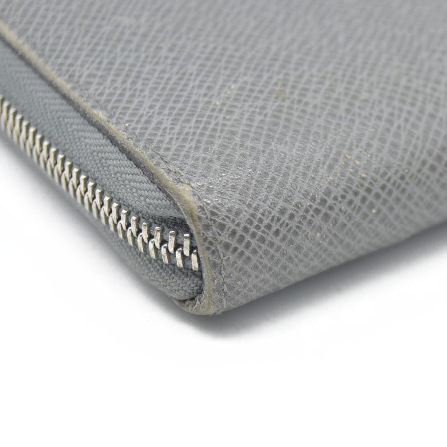 AUCTION $985 Louis Vuitton  Taiga Zippy Organizer Wallet Glacier