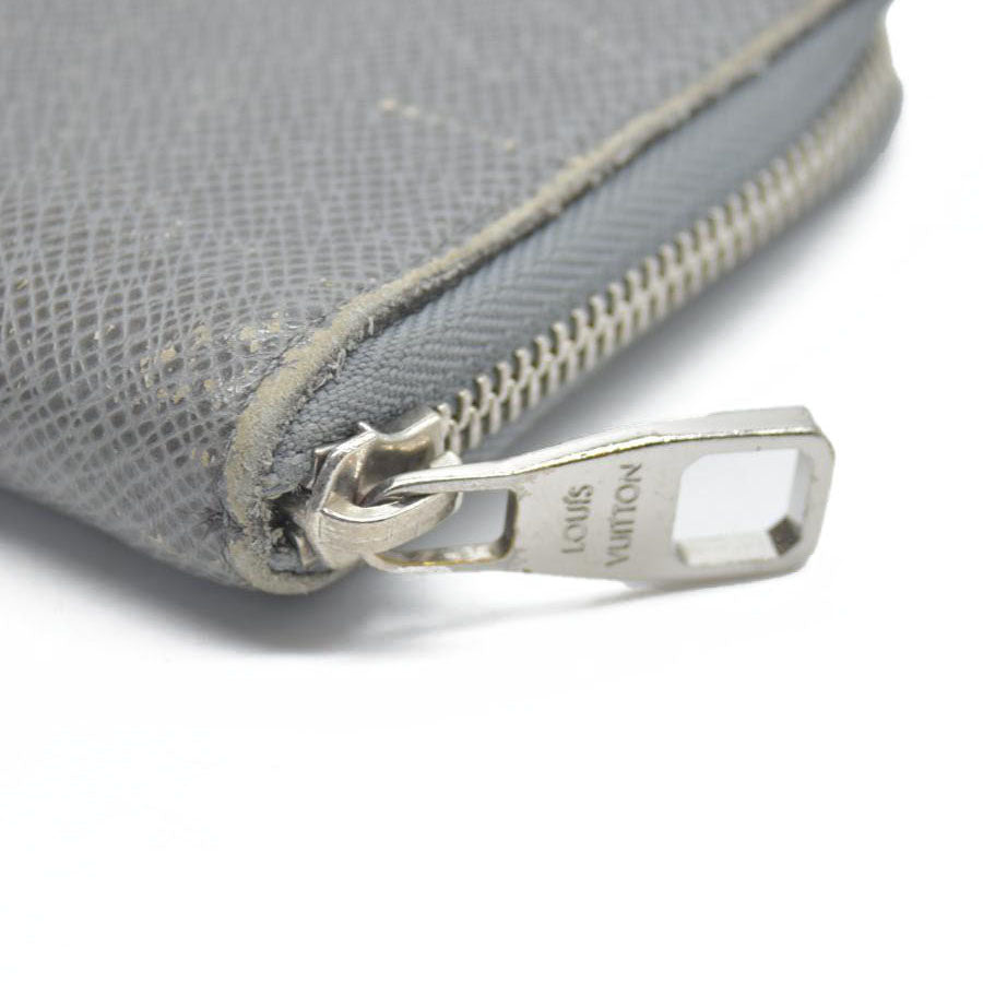 AUCTION $985 Louis Vuitton  Taiga Zippy Organizer Wallet Glacier