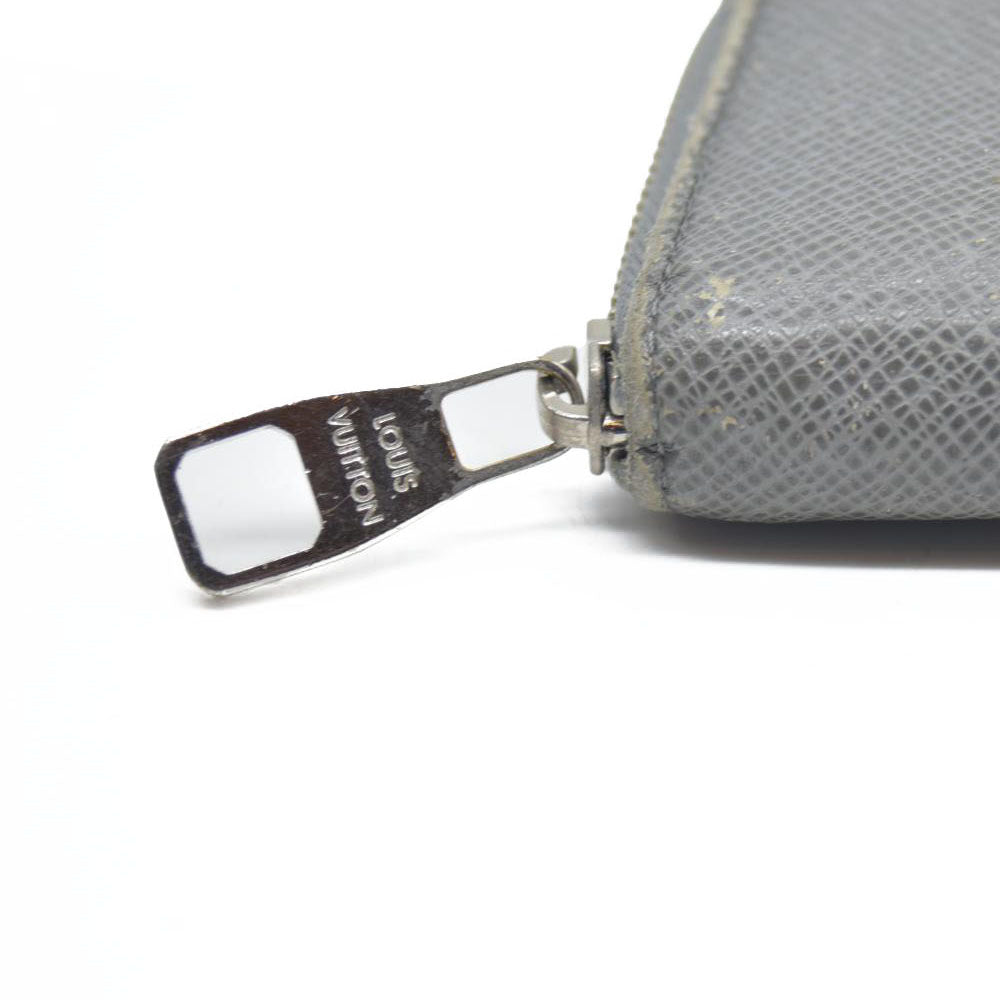 AUCTION $985 Louis Vuitton  Taiga Zippy Organizer Wallet Glacier