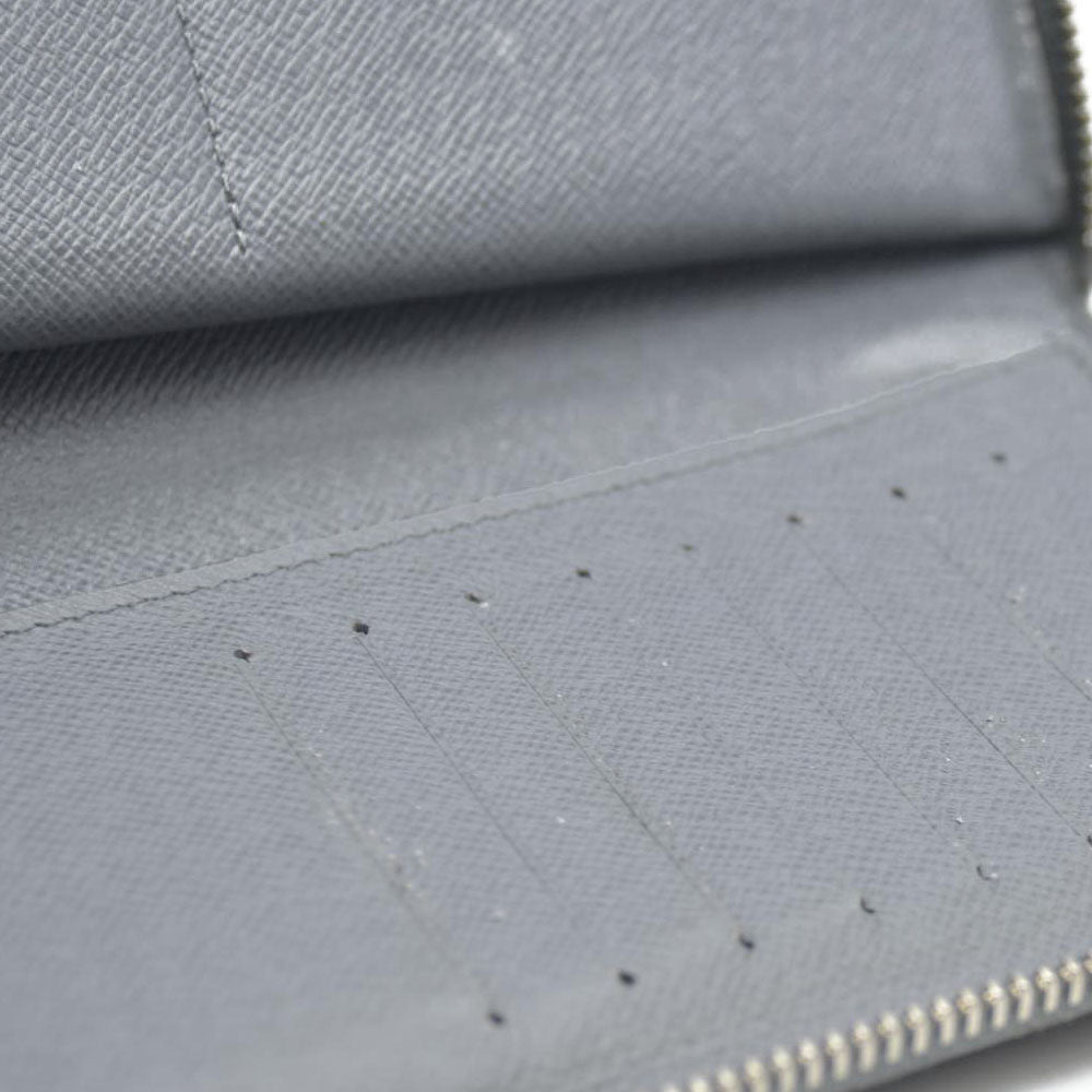 AUCTION $985 Louis Vuitton  Taiga Zippy Organizer Wallet Glacier