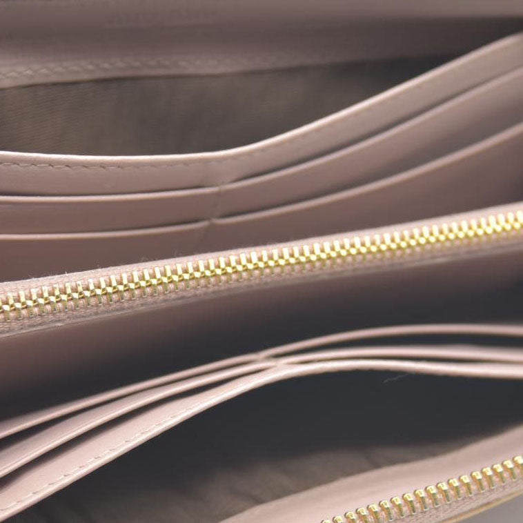 MIU MIU Logo Embossed Leather Zippy Long Wallet Beige