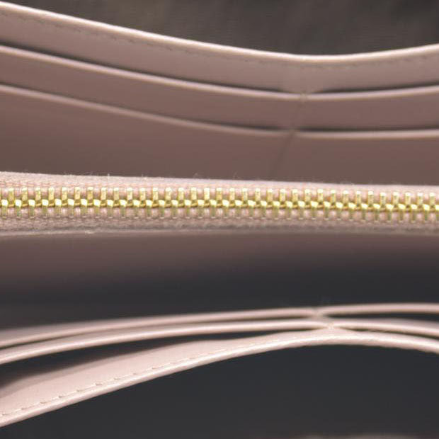 MIU MIU Logo Embossed Leather Zippy Long Wallet Beige