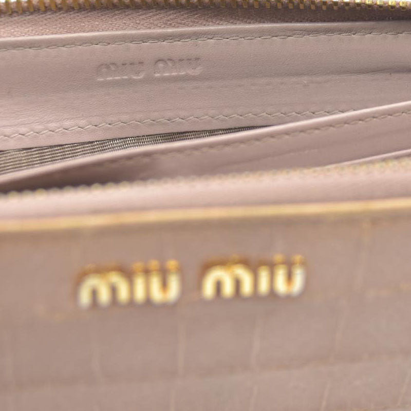 MIU MIU Logo Embossed Leather Zippy Long Wallet Beige