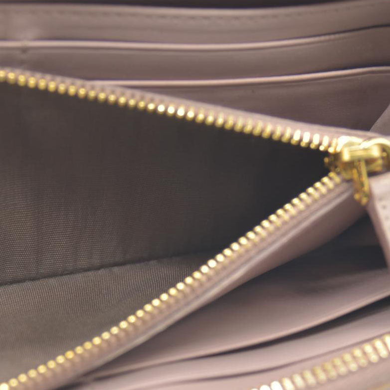 MIU MIU Logo Embossed Leather Zippy Long Wallet Beige