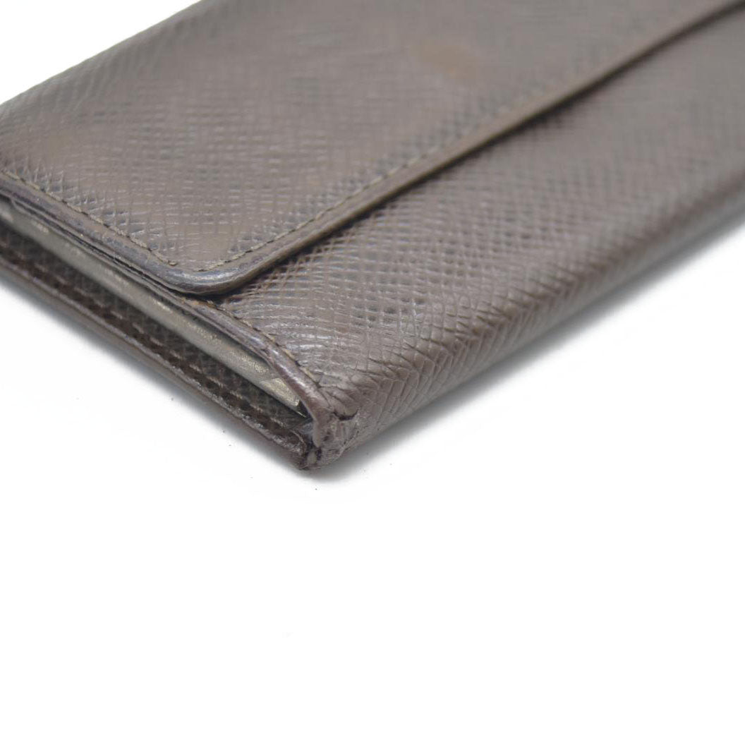 AUCTION $415 Louis Vuitton  Taiga 6 Key Holder Grizzli