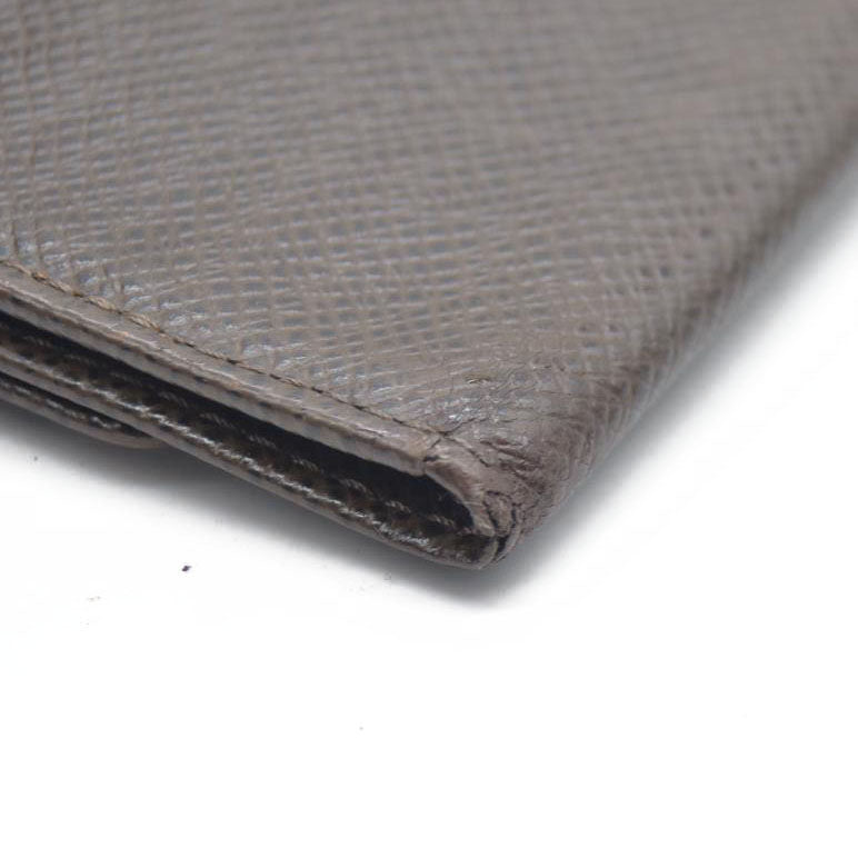 AUCTION $415 Louis Vuitton  Taiga 6 Key Holder Grizzli