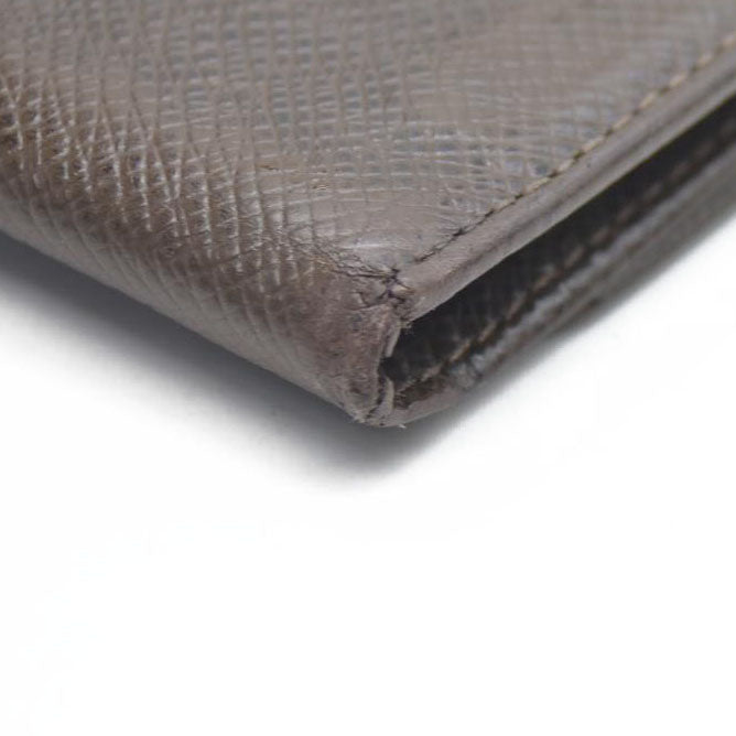 AUCTION $415 Louis Vuitton  Taiga 6 Key Holder Grizzli