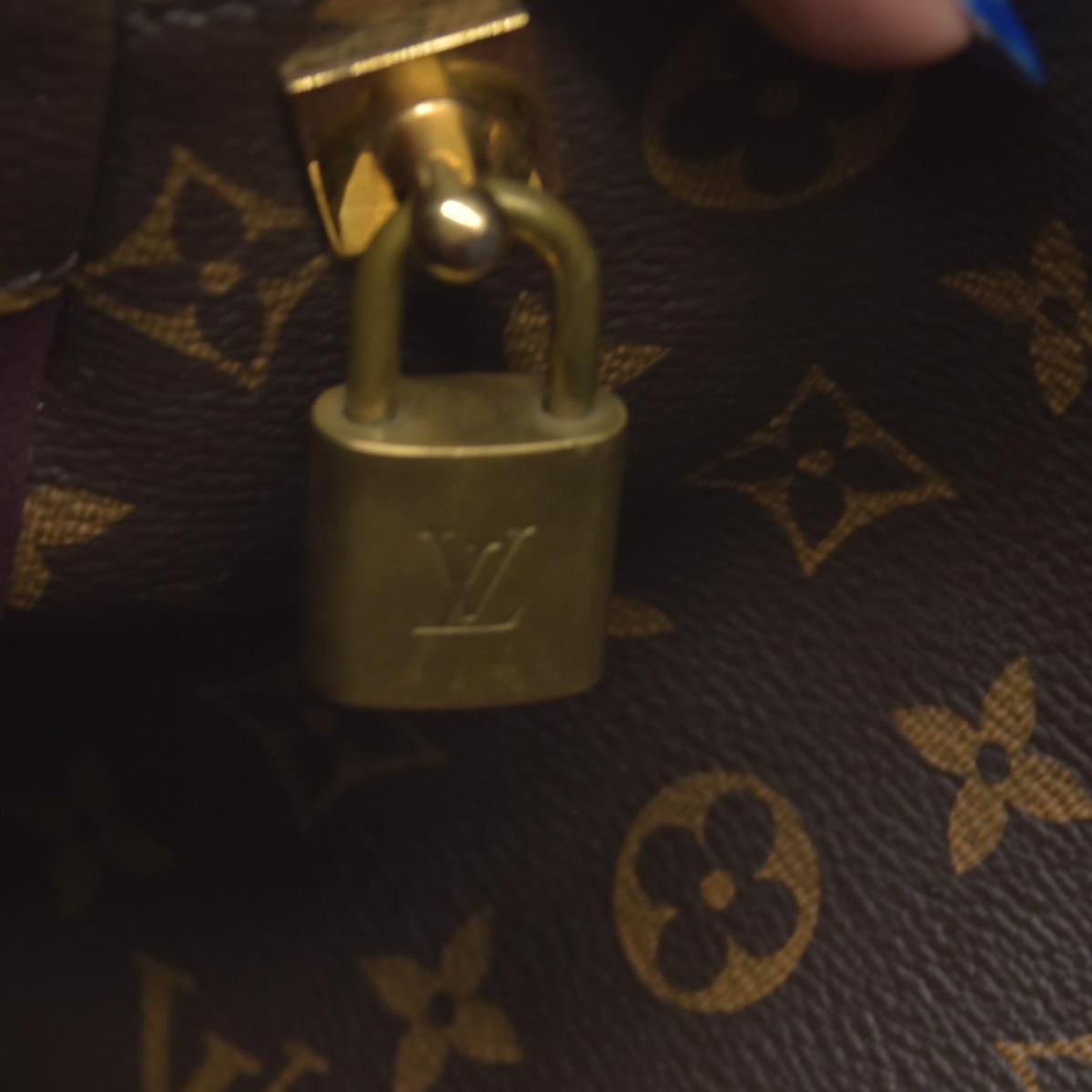 $2910 Louis Vuitton Monogram Montaigne MM
