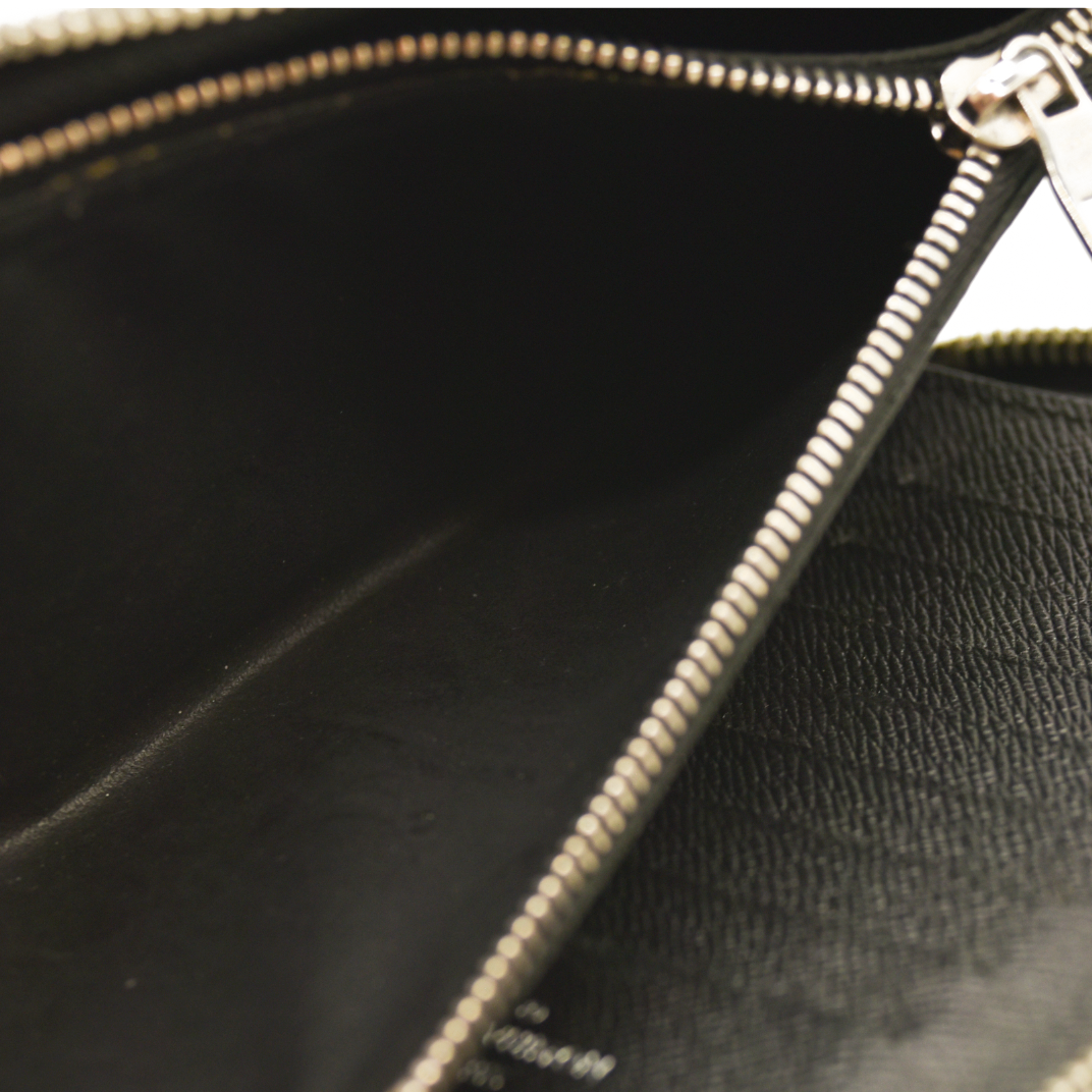 Louis Vuitton  Monogram Macassar Vertical Zippy Wallet