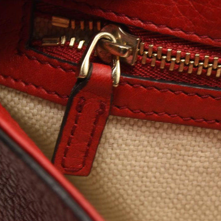 GUCCI Pebbled Calfskin Medium Soho Flap Crossbody Red