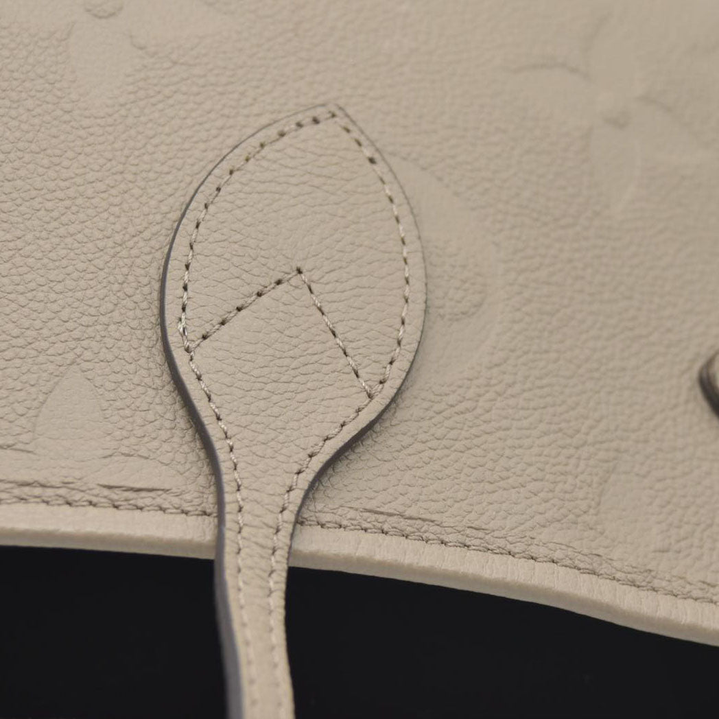 $2940 Louis Vuitton Empreinte Leather Neverfull MM