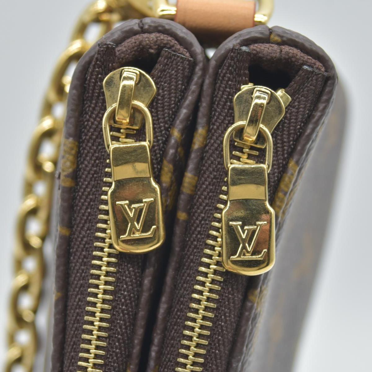 $1890 Louis Vuitton Monogram Liv Pochette