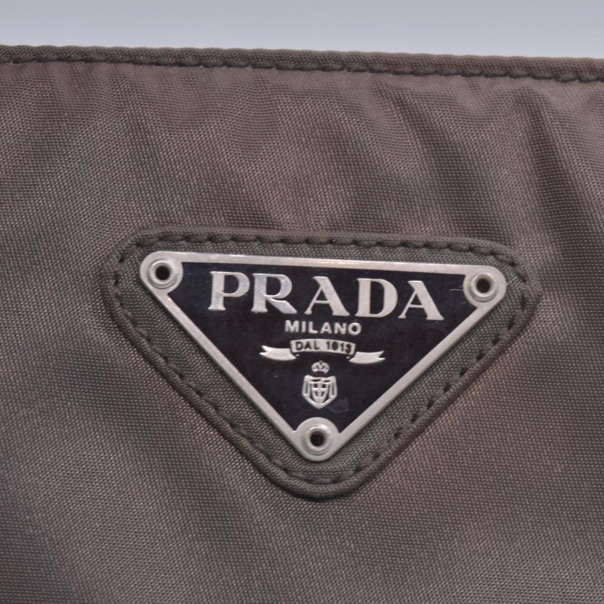 Prada  Enameled Metal Triangle Top Handle Bag