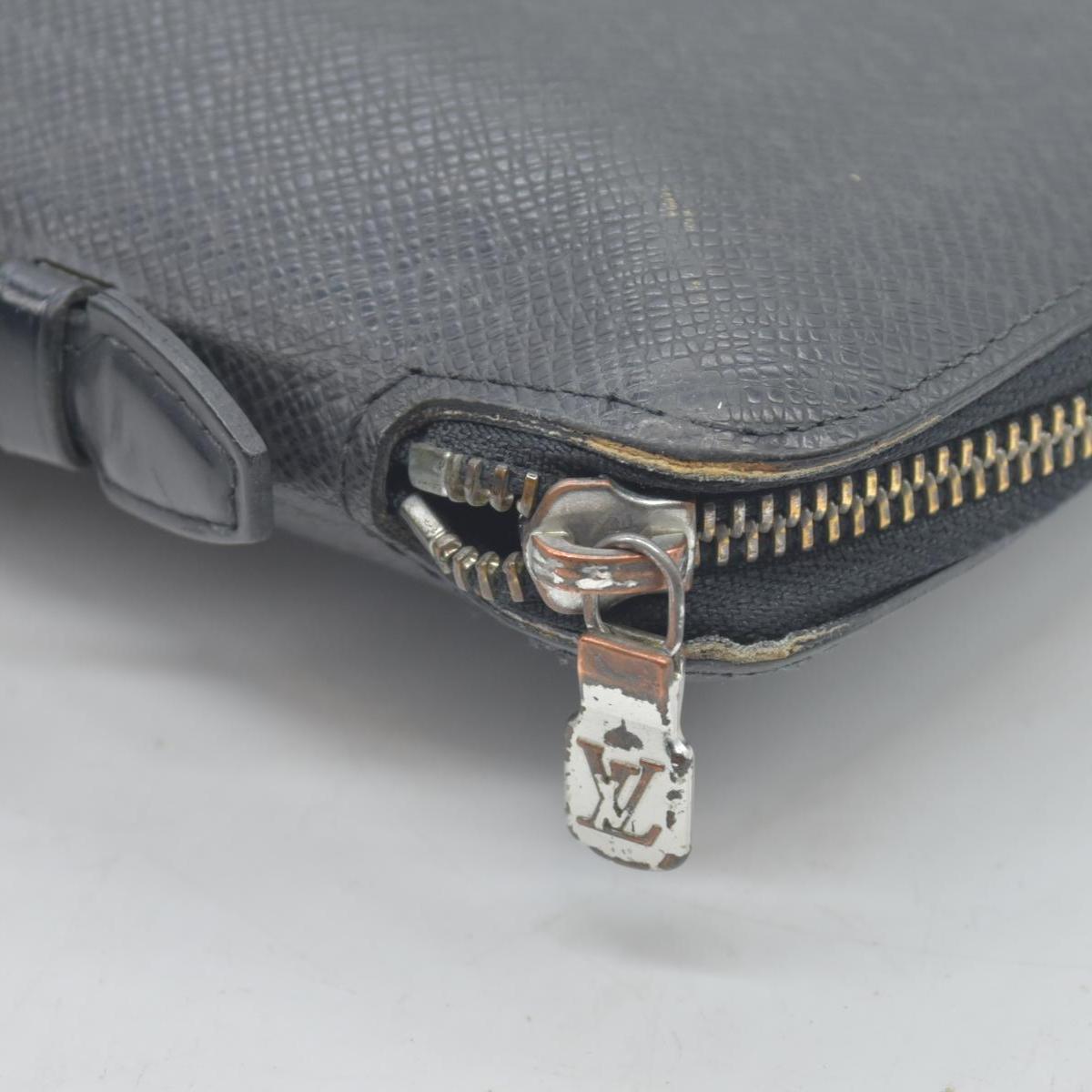 $1250 Louis Vuitton  Taiga Leather Atoll Organizer Wallet CONSIGNMENT