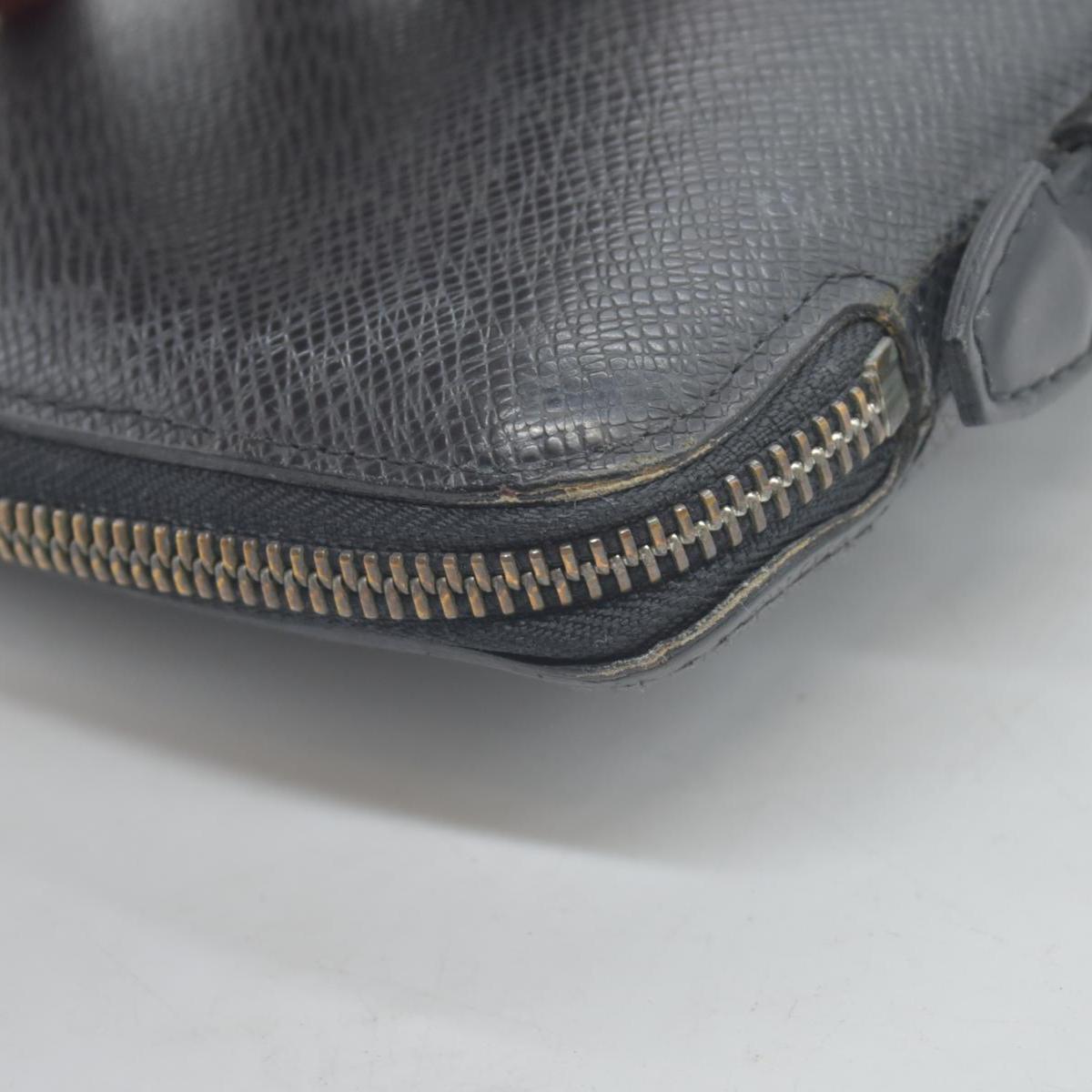 $1250 Louis Vuitton  Taiga Leather Atoll Organizer Wallet CONSIGNMENT