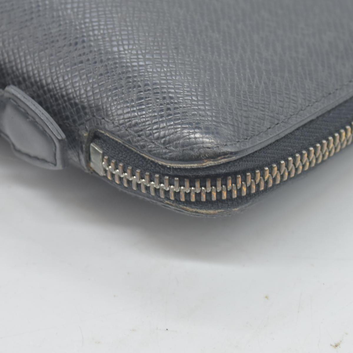 $1250 Louis Vuitton  Taiga Leather Atoll Organizer Wallet CONSIGNMENT