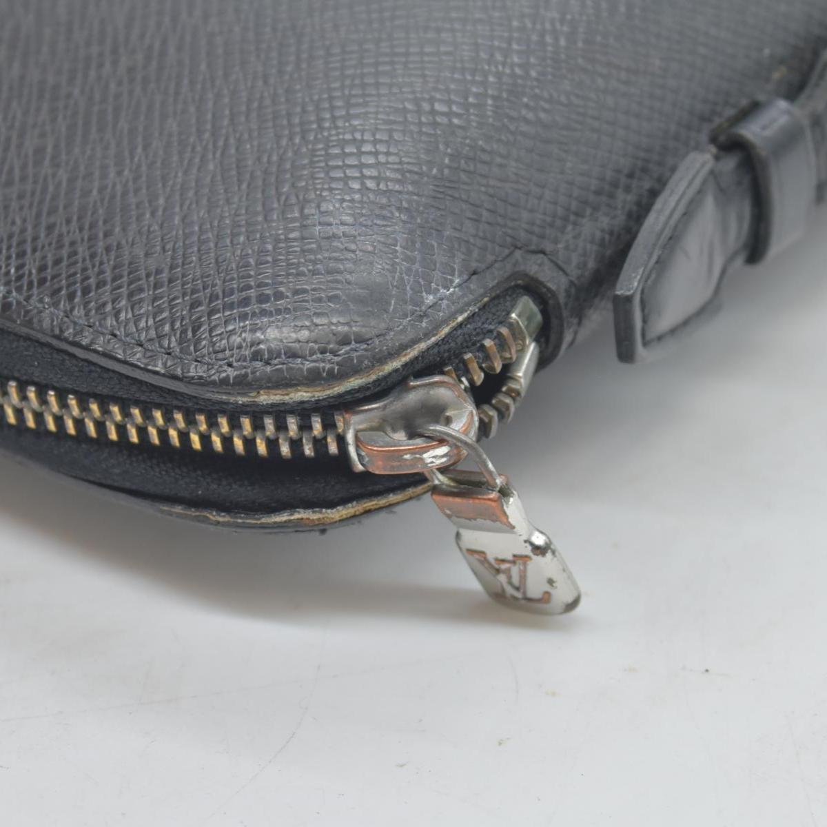 $1250 Louis Vuitton  Taiga Leather Atoll Organizer Wallet CONSIGNMENT