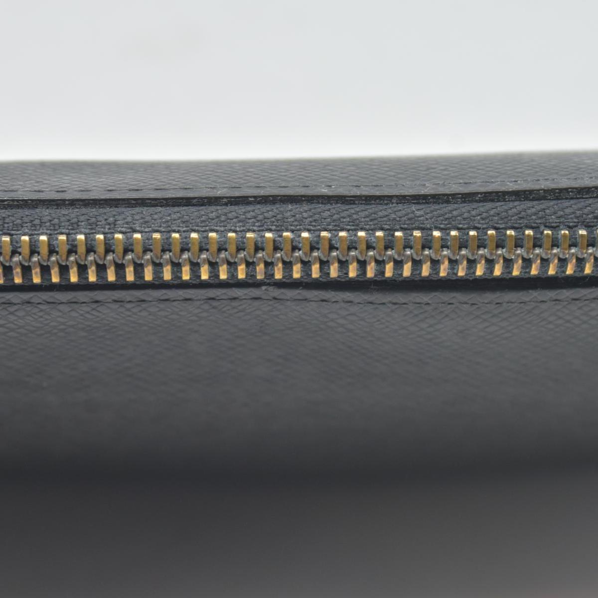 $1250 Louis Vuitton  Taiga Leather Atoll Organizer Wallet CONSIGNMENT