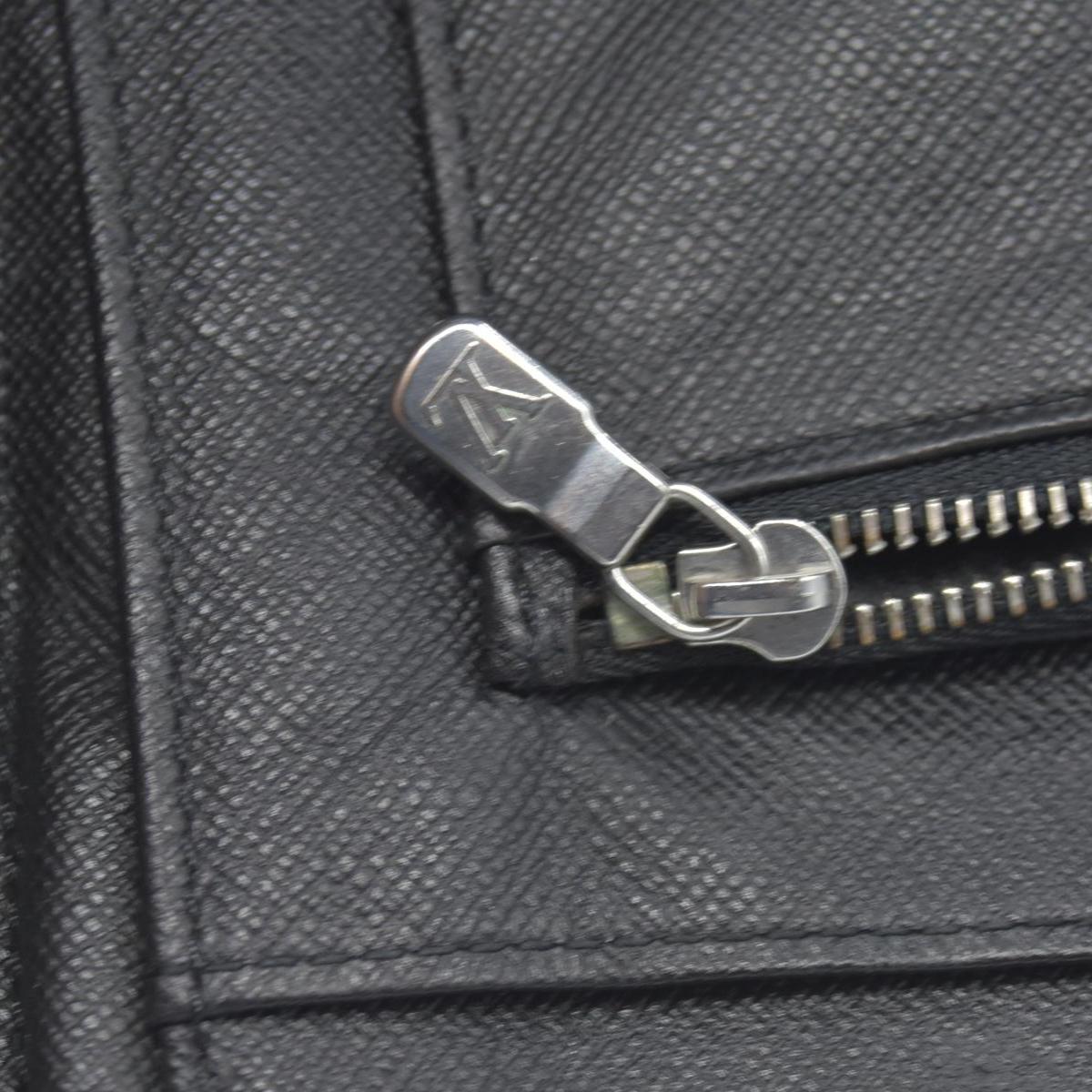 $1250 Louis Vuitton  Taiga Leather Atoll Organizer Wallet CONSIGNMENT