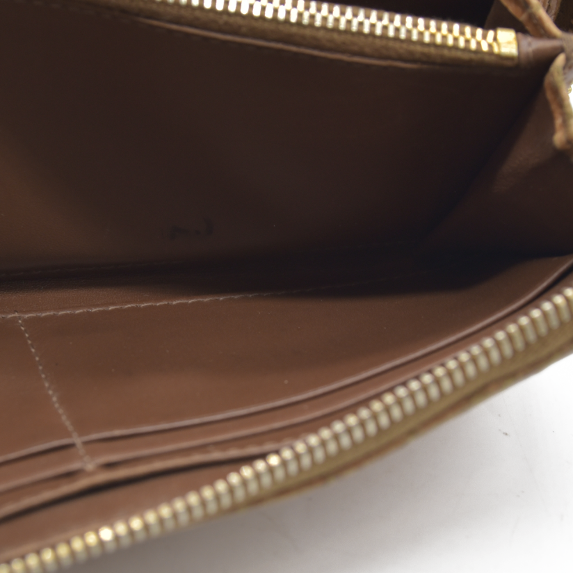 AUCTION $995 MIU MIU Logo Embossed Leather Zippy Long Wallet Beige